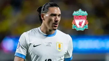 Darwin Nuñez looks serious as he wears the Uruguay jersey at the Copa America and the Liverpool badge is next to him. (Source: AP)