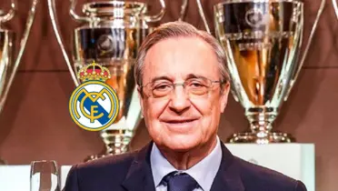 Florentino Perez smiles as he wears a suit and the Real Madrid badge is next to him. (Source: The Madrid Zone X)