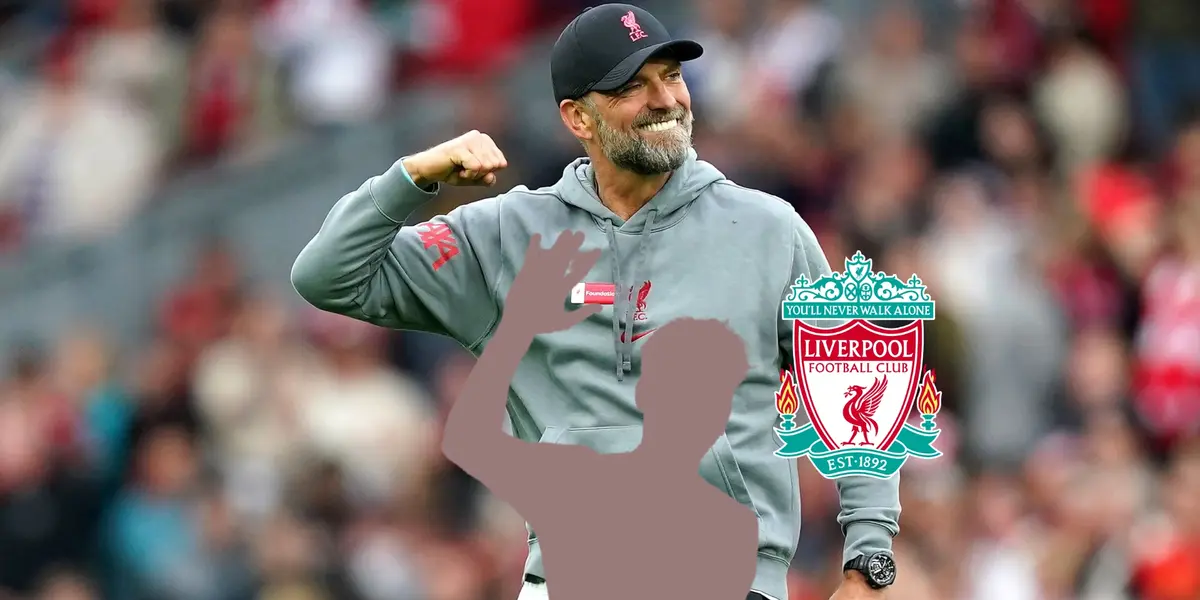 Jurgen Kloop is happy as the Liverpool manager while a mystery player is next to the Liverpool badge. (Source: PA Wire)