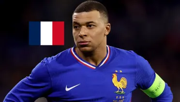 Kylian Mbappé looks serious while he wears the France jersey and the French flag is next to him. (Source: KM 10 Zone X)