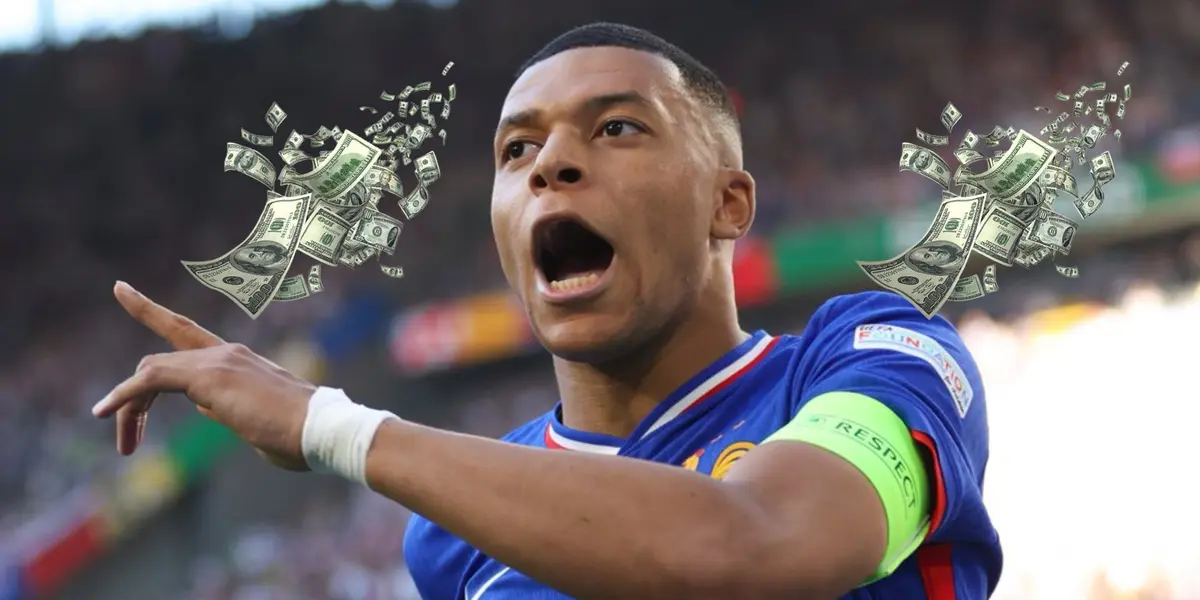 Kylian Mbappé shouts as he celebrates his goal in the EUROS while flying money is next to him. (Source: EURO 2024 X)
