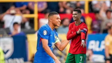 Kylian Mbappé smiles while he wears the France jersey and Cristiano Ronaldo smiles with the Portugal jersey. (Source: Madrid Universal X)