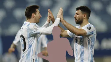 Lionel Messi and Sergio Aguero celebrate an Argentina goal together and a mystery player is in between the two. (AP Photo)