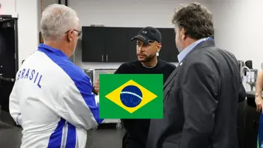 Neymar shakes hands with the Brazilian national team coach Dorival Junior and the Brazil flag is in the middle. (Source: Neymar Jr. X)