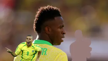 Vinicius Jr. looks to the side while Ronaldo Nazario celebrates his goal for Brazil and a mystery Brazilian legend holds a special prize. (Source: Getty Images) 